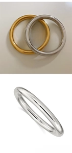 Polished gold and silver stainless steel minimalist bangles with a glossy mirror finish