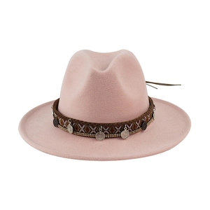 Pink ethnic style felt fedora hat featuring a decorative woven band with silver coin charms