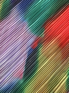 Detailed view of shimmering gradient plissé fabric with metallic iridescent texture