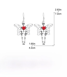 Detail showing Gothic skull butterfly earrings size 7.2x4.2cm with red heart