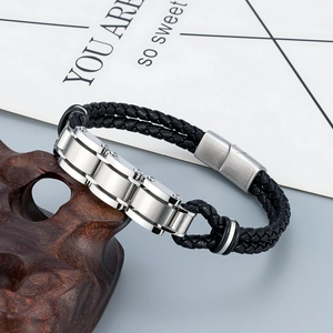 Mens fashion titanium steel braided leather bracelet with silver buckle on wooden stand