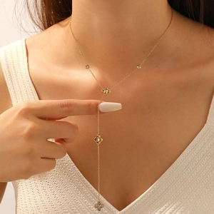 Elegant gold plated Y-necklace with crystal hollow flower pendant and long tassel chain