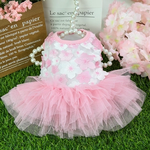 Close-up of pink flower petal details and layered tulle on the pet princess dress