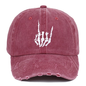 Vintage washed red cotton baseball cap with skeleton hand embroidery and distressed holes