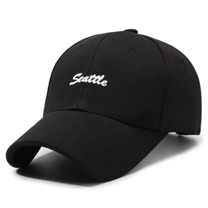 Black pineapple fabric baseball cap with white Seattle embroidery and curved brim
