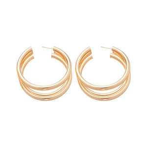 Minimalist multi-layered gold metal round hoop earrings with a polished finish and three nested rings