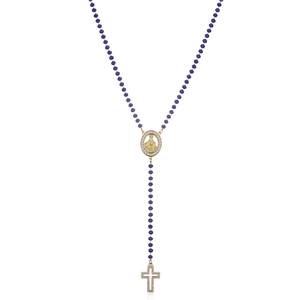 Detail of purple bead rosary necklace with gold Virgin Mary medal and diamond cross