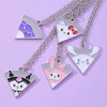 Detailed view of silver chain necklaces with Sanrio character enamel pendants