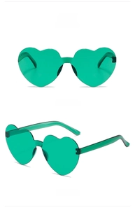 Front and 45-degree side view of green translucent heart-shaped rimless sunglasses