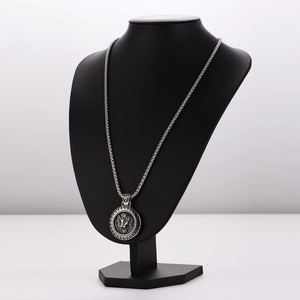 Vintage stainless steel lion head pendant necklace with silver box chain on mannequin