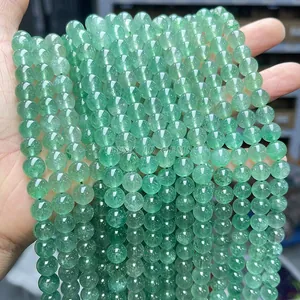 Macro shot of natural green aventurine round beads for DIY jewelry making accessories