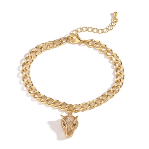 Hip hop style gold Cuban chain bracelet featuring a sparkling leopard head charm with zircons