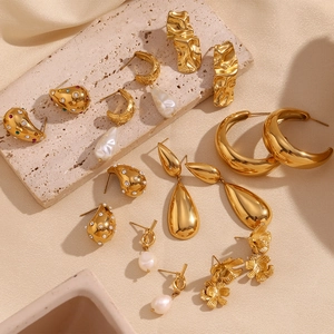 Detailed collection of 18K gold plated steel earrings featuring pleated and teardrop designs
