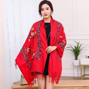 Red floral embroidered shawl scarf with elegant fringe tassels in a soft warm fabric