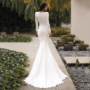 Elegant white satin mermaid wedding dress with long sleeves and button back detail