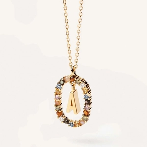 Golden necklace with round letter A pendant featuring colorful crystal gemstones
