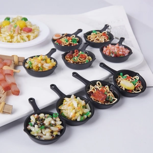 Miniature food pan keychains featuring realistic fried rice and noodles styles
