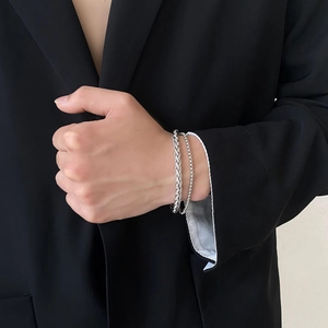 Minimalist double-layered titanium steel chain bracelet for men worn on a wrist
