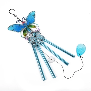 Detail of blue metal butterfly wind chime with four tubes and glass pendant