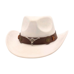 Detail of silver bull head emblem on white suede cowboy hat with brown leather band