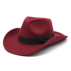 Detail of burgundy wool western cowboy hat featuring classic black ribbon and bow