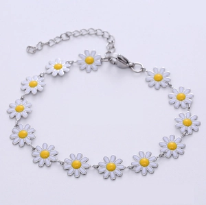 Bracelet ajustable marguerites en acier inoxydable avec fleurs en émail blanc et fermoir