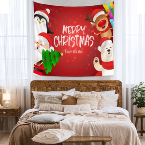 Cozy bedroom interior featuring a vibrant red Christmas tapestry hung above a wooden bed frame