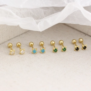 Minimalist S925 silver star earrings with colorful square gems on beige fabric