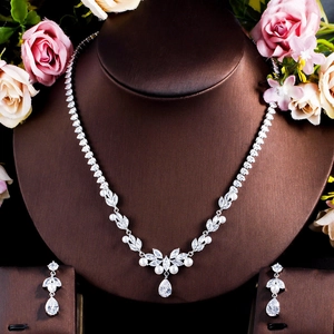 Elegant silver necklace and earrings set with white pearls and AAA zircons for wedding