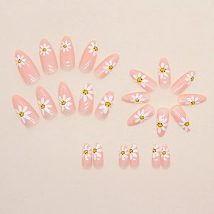 Pink almond press-on nails set with cute white daisy flowers and yellow smiley face pattern