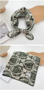 Detail of vintage floral cotton-linen square scarf with dark green and white print