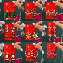 Detailed grid of nine Christmas earrings including reindeer, snow and festive trees