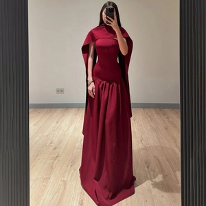Deep red bodycon dress with matching capelet wrap for 2025 elegant evening wear