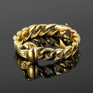 Men's gold-plated stainless steel Cuban link bracelet with boxing glove clasp detail