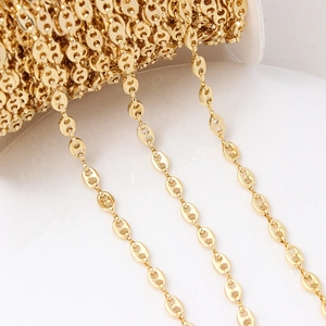 Macro shot of 18K gold plated coffee bean links for DIY jewelry and bracelet making
