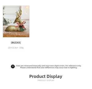 Detail of 22x11cm gold glitter Christmas reindeer figurine with festive bow and pine cone