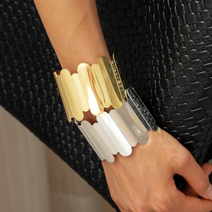 Irregular geometric wavy open cuff bracelet in two-tone gold and silver metallic finish