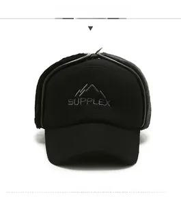 Detail of black winter baseball hat with ear flaps and Supplex embroidered logo