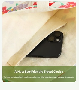 Internal detail of floral canvas tote bag featuring an open pocket for smartphone storage