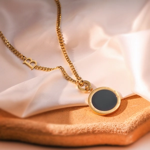 Gold-plated titanium steel necklace with Roman numeral mother of pearl circle pendant