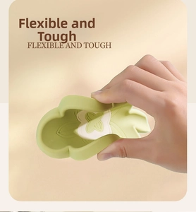 Flexible and tough light green silicone soap dish demonstrating high elastic durability