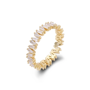 Detailed view of V-shaped gold ring with rectangular zircon stones on white background