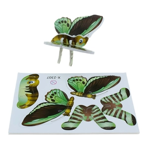 Detailed view of 3D butterfly puzzle model and flat parts board for easy DIY assembly
