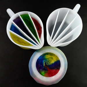 5-slot silicone split cup for resin art mixing and fluid paint pouring on black background