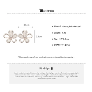 Detail view of hollow flower earrings with dimensions 2.5cm and material specs
