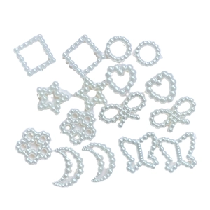 Various white ABS pearl shapes including heart, star, moon and bows for DIY jewelry making