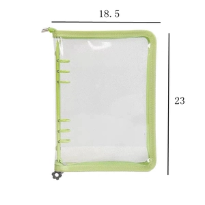 Detailed view of clear PVC binder with light green trim showing 18.5x23cm dimensions