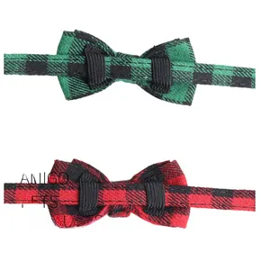 Detail of red and green plaid pet bow ties with elastic bands for collars