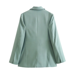 Detailed back view of light green women's blazer showing tailored fit and clean seams