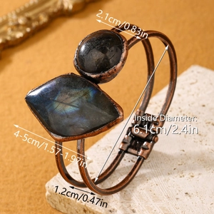 Vintage copper cuff bracelet featuring large natural labradorite and black stones